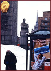 Moscow, Western advertisement below Lenin memorial.